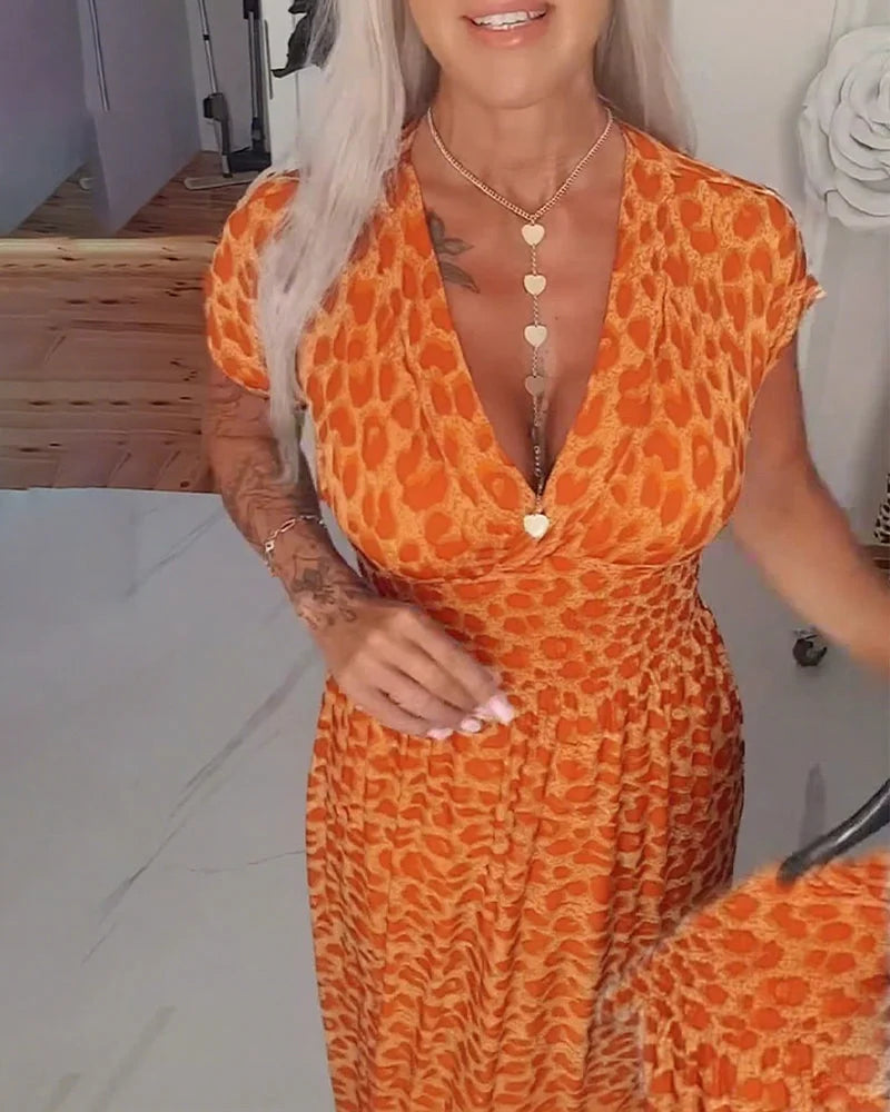 Erendira – Elegant Kjole Med V-Hals Og Leopardmønster